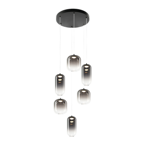This stunning use of both material and glass, shows off a unique reflection when lit. Coming in a variety of size pendant and wall light, this will be ideal for many modern designs.