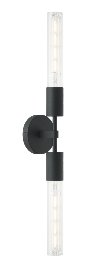 The Lumière is a modern wall vanity in an Aged Gold Brass or Matte Black socket and round backplate complemented by ribbed glass. Available in single or 2 light.